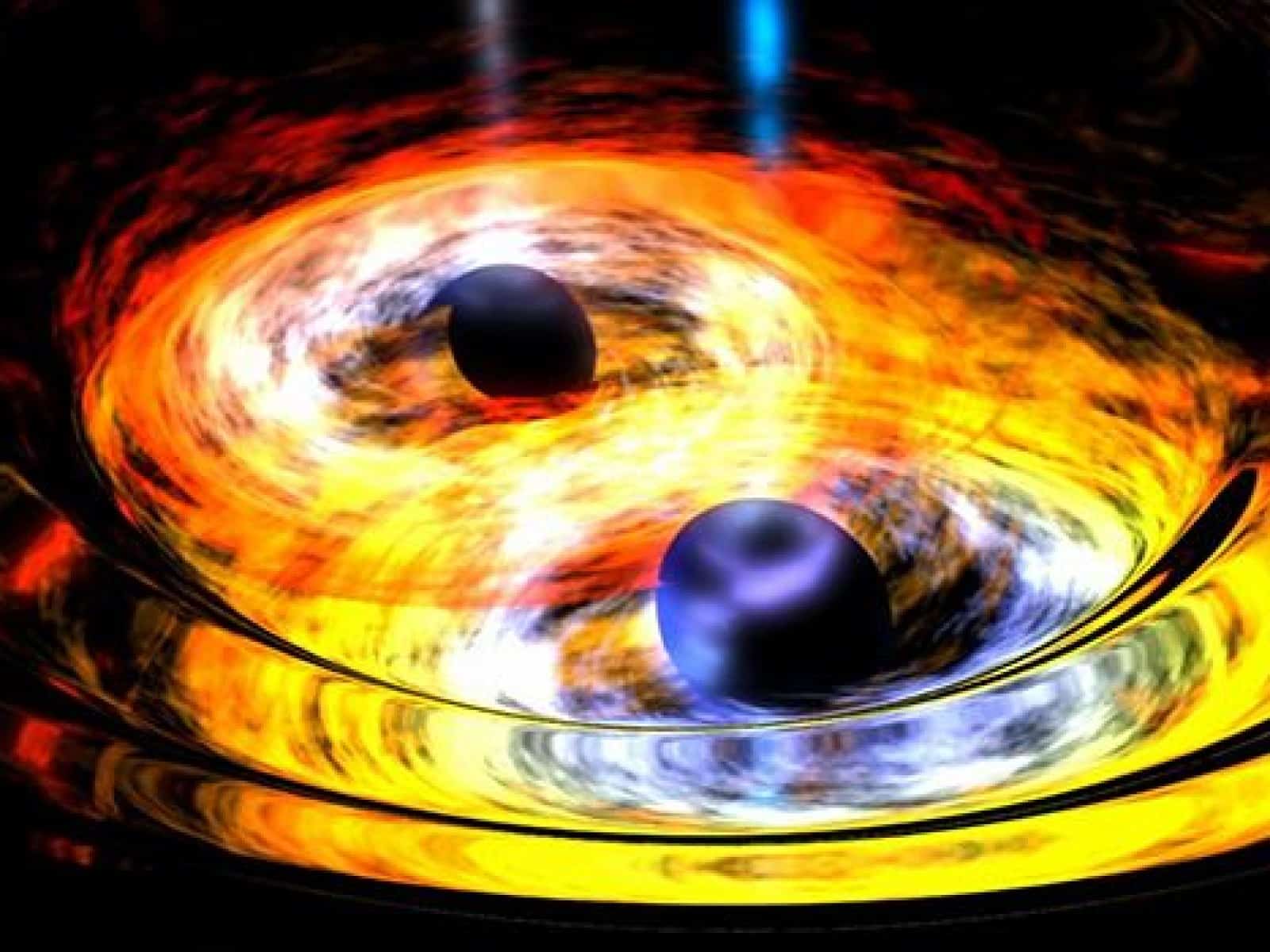 Слияние двух сверхмассивных черных дыр в представлении художника / © NASA