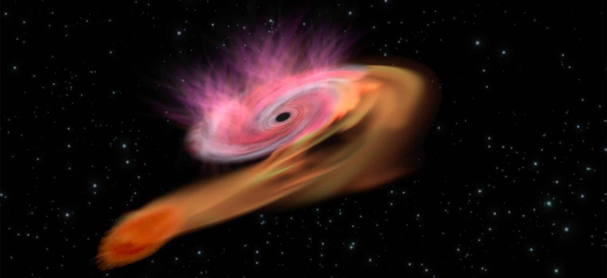 Приливное разрушение звезды черной дырой в представлении художника / © ESA/C. Carreau
