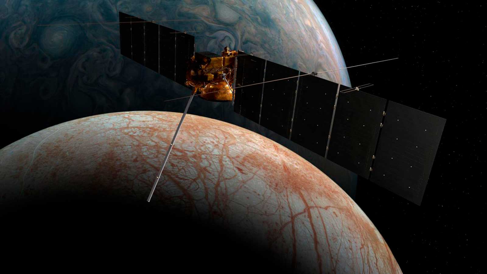 Зонд Europa Clipper над спутником Юпитера Европой в представлении художника / © NASA