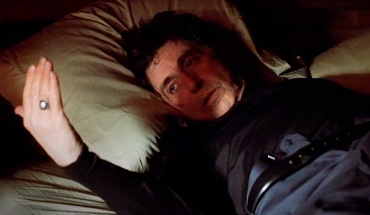 Кадр из детективного триллера «Бессонница», снятого в 2002 году / © Warner Bros., Alcon Entertainment