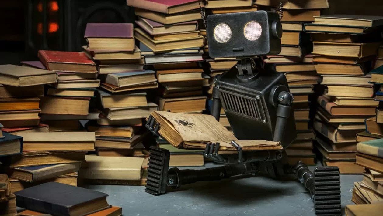 Робот читает книгу / © Vasilyev Alexandr, Shutterstock