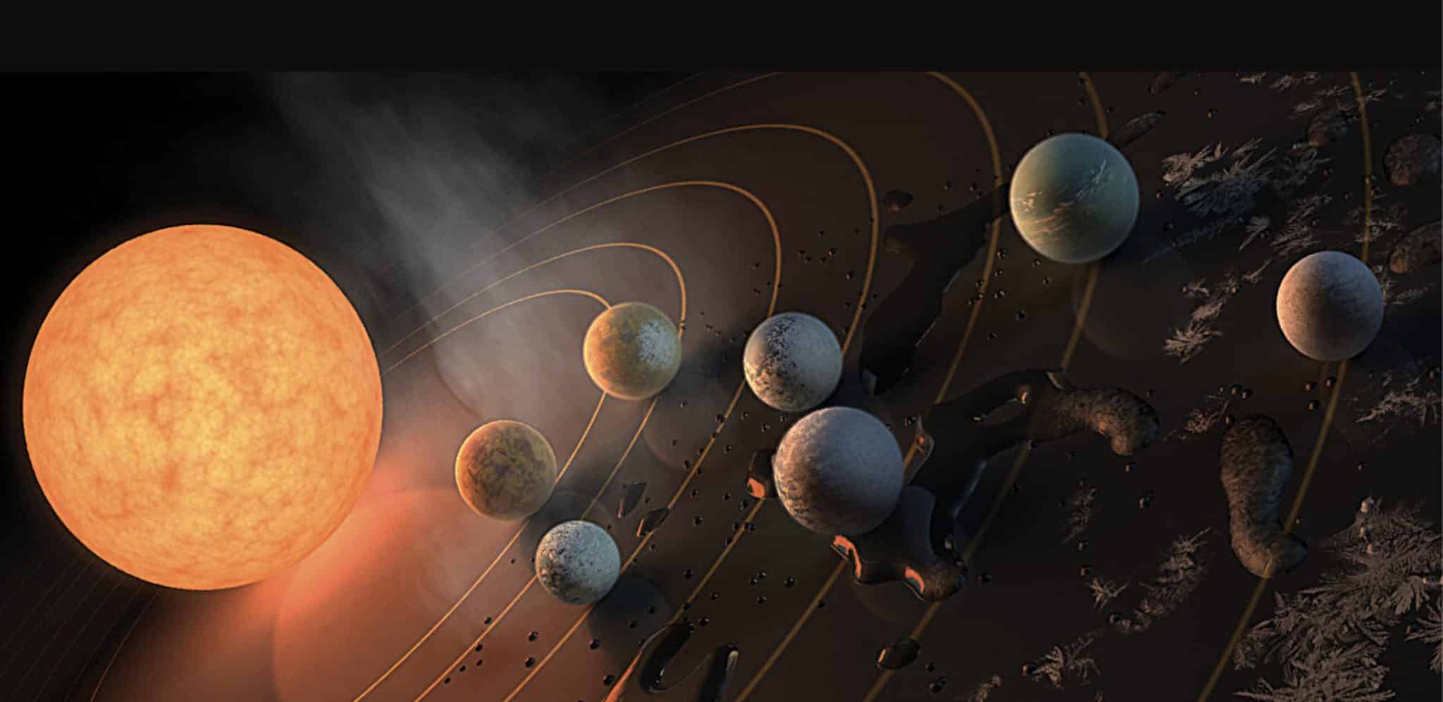 Система TRAPPIST-1 в представлении художника и ее планеты. Потенциальное наличие воды в каждом из миров изображено инеем, окружающим водяные лужи и пар. / © NASA/R. Hurt/T. Pyle